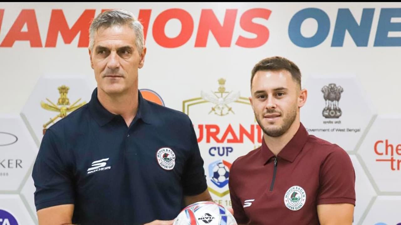 Panagiotis Dilmperis, Head Coach, Mohun Bagan Super Giant, and Dejan Dražić, player, Mohun Bagan Super Giant, pose with the official match ball of the 135th Durand Cup during the official pre match press conference. (Photo: Durand Cup) Panagiotis Dilmperis, Head Coach, Mohun Bagan Super Giant, and Dejan Dražić, player, Mohun Bagan Super Giant, pose with the official match ball of the 135th Durand Cup during the official pre match press conference. (Photo: Durand Cup)