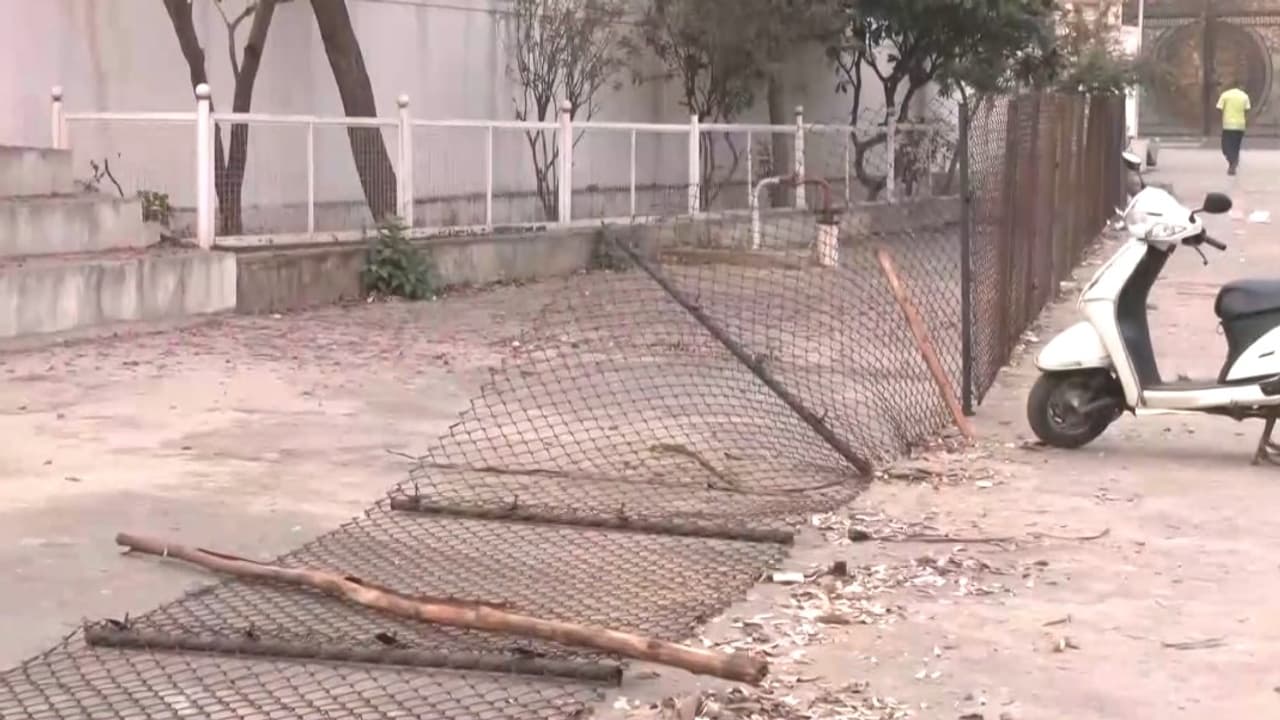 Torn banner outside the MLA G Janardhana Reddy's house (Photo/ANI) Torn banner outside the MLA G Janardhana Reddy's house (Photo/ANI)