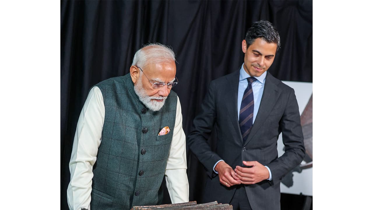 PM Modi attends the ceremony for the Restitution of Chola Copper Plate (Photo/ANI) PM Modi attends the ceremony for the Restitution of Chola Copper Plate (Photo/ANI)