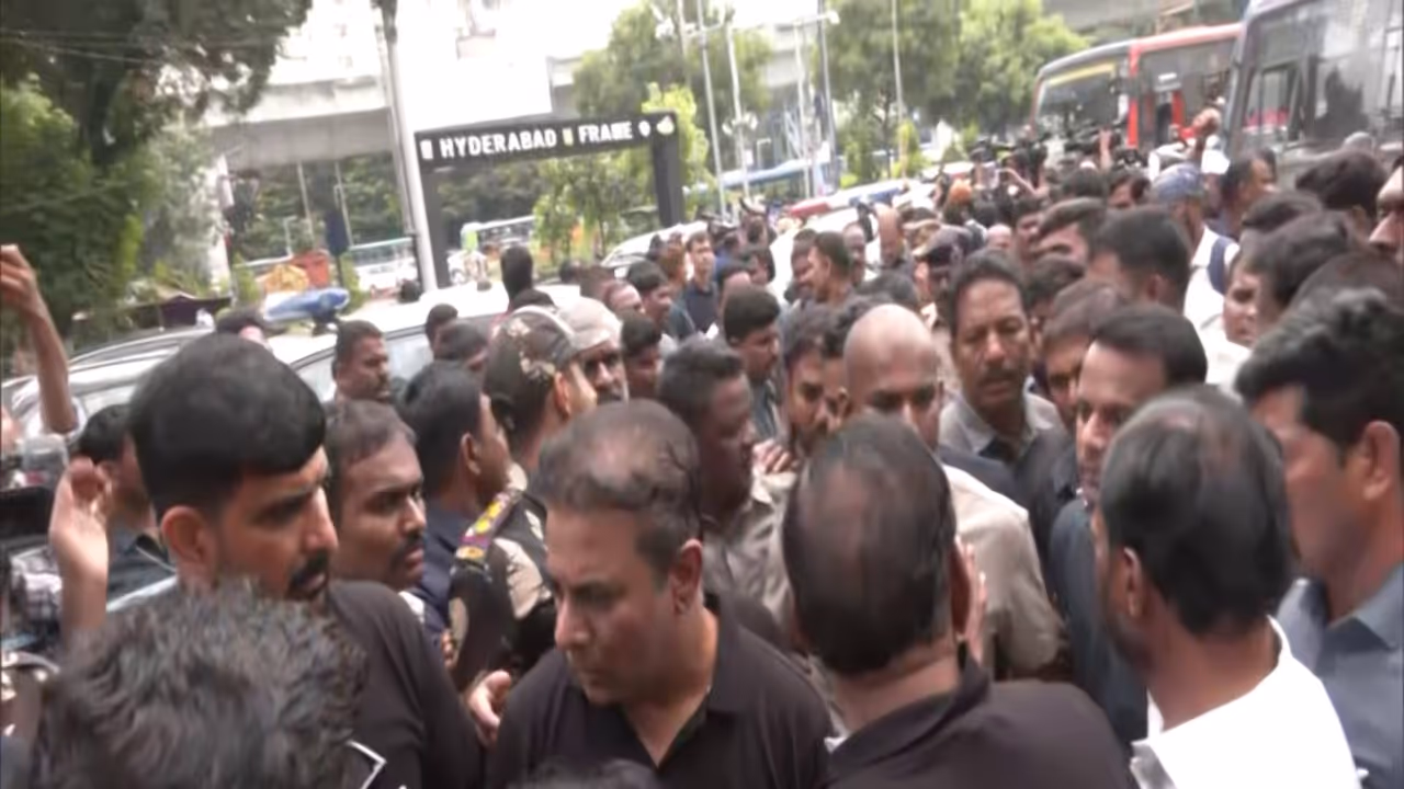 BRS chief KT Rama Rao during protest at Telangana Assembly gate (Photo/ANI) BRS chief KT Rama Rao during protest at Telangana Assembly gate (Photo/ANI)