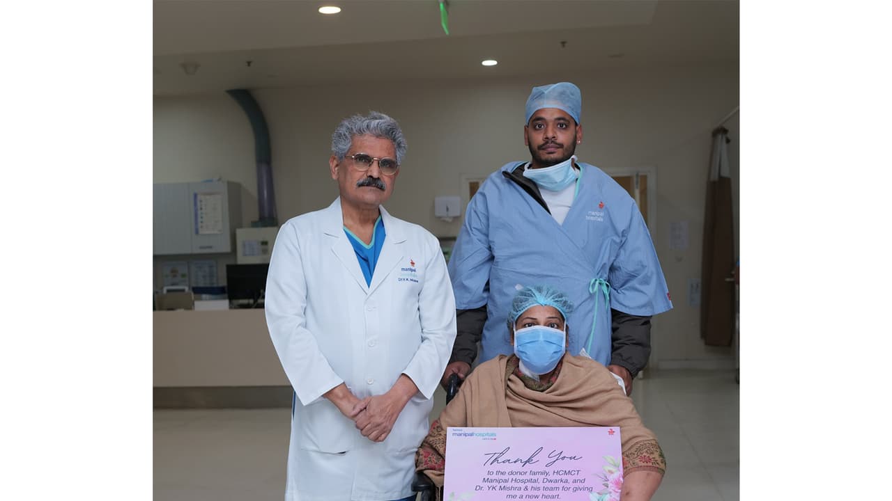 Dr. Yugal Kishore Mishra and Viji Varghese with the patient in Delhi. (Photo/ANI)