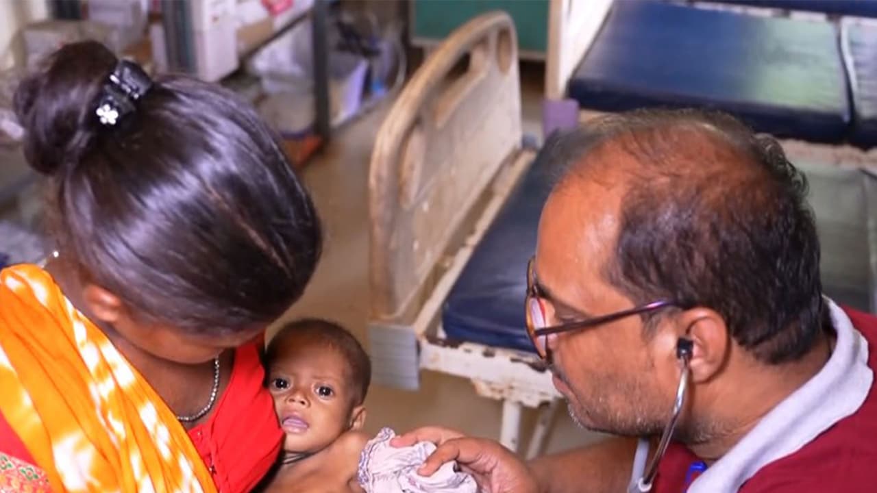 Visual of a doctor treating an infant in Sukma (Photo/ANI) Visual of a doctor treating an infant in Sukma (Photo/ANI)