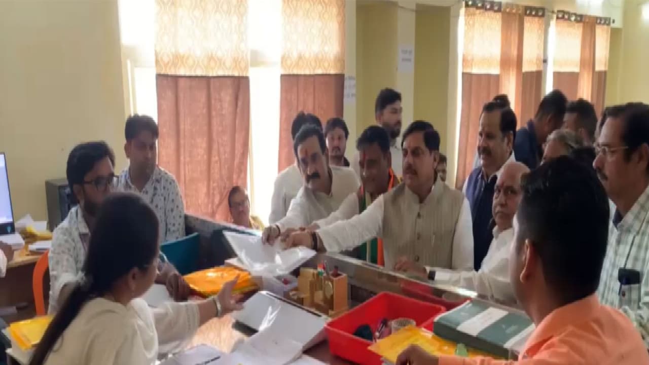 BJP candidate Ashutosh Tiwari accompanied with CM Mohan Yadav and senior BJP leader Narottam Mishra (Photo/ANI) BJP candidate Ashutosh Tiwari accompanied with CM Mohan Yadav and senior BJP leader Narottam Mishra (Photo/ANI)