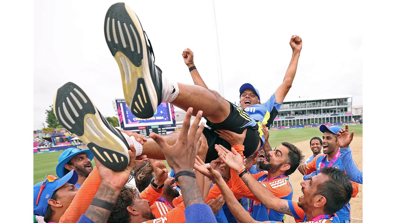Rahul Dravid being lifted by his team after T20 WC win. (Photo: ANI) Rahul Dravid being lifted by his team after T20 WC win. (Photo: ANI)