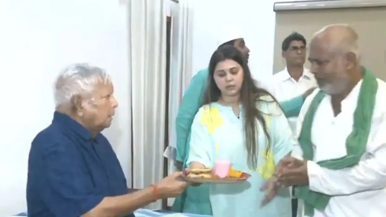 RJD workers extend their wishes to RJD chief Lalu Prasad Yadav on his birthday. (Photo/ANI) RJD workers extend their wishes to RJD chief Lalu Prasad Yadav on his birthday. (Photo/ANI)