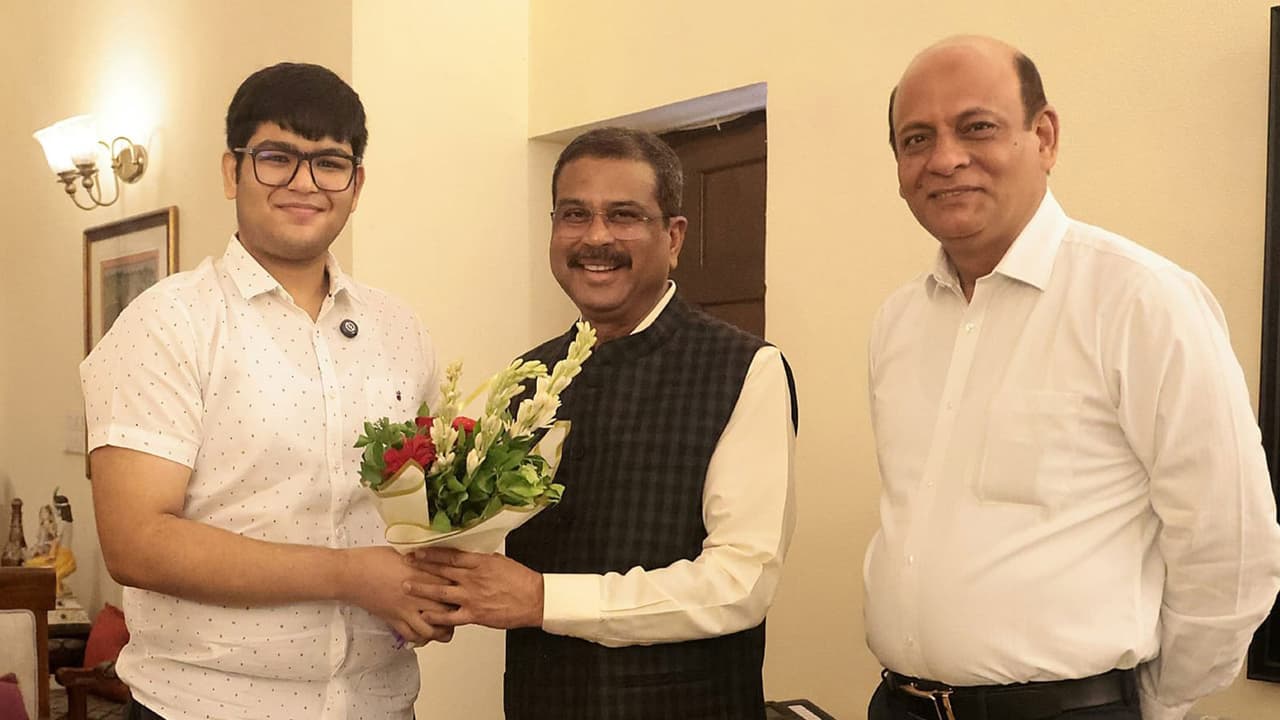 Education Minister Dharmendra Pradhan with Panshul Bansal (Photo X/ Dharmendra Pradhan) Education Minister Dharmendra Pradhan with Panshul Bansal (Photo X/ Dharmendra Pradhan)