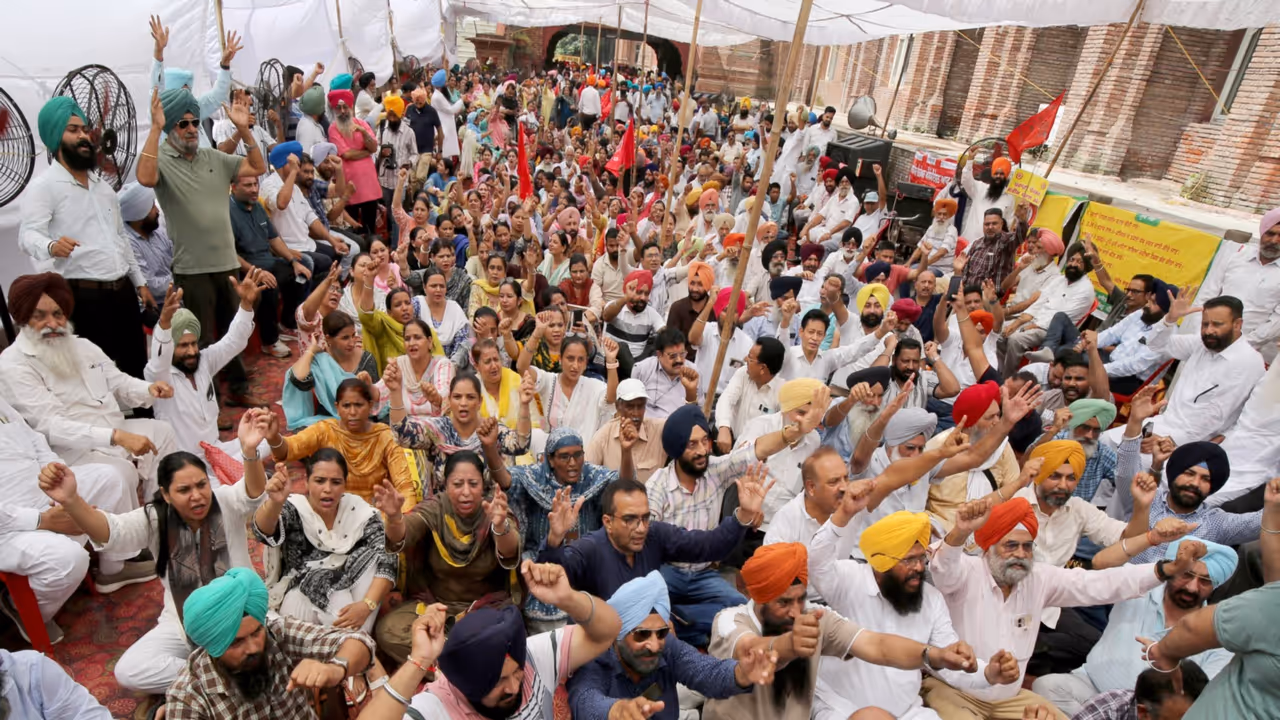 Punjab government employees and pensioners hold a statewide strike outside the Deputy Commissioner's office on August 27, 2026 (Photo:ANI) Punjab government employees and pensioners hold a statewide strike outside the Deputy Commissioner's office on August 27, 2026 (Photo:ANI)