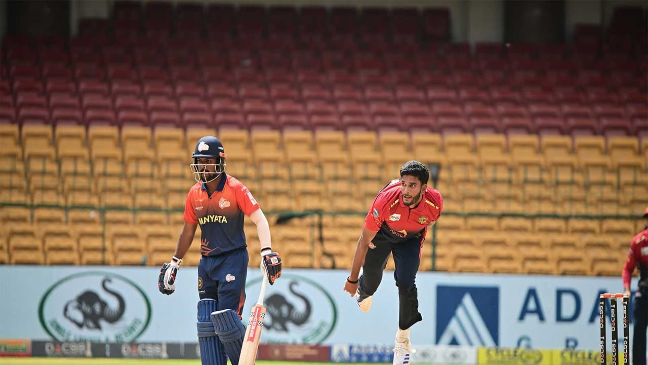 Dhanush Gowda bowling (Photo: Maharaja Trophy KSCA T20) Dhanush Gowda bowling (Photo: Maharaja Trophy KSCA T20)