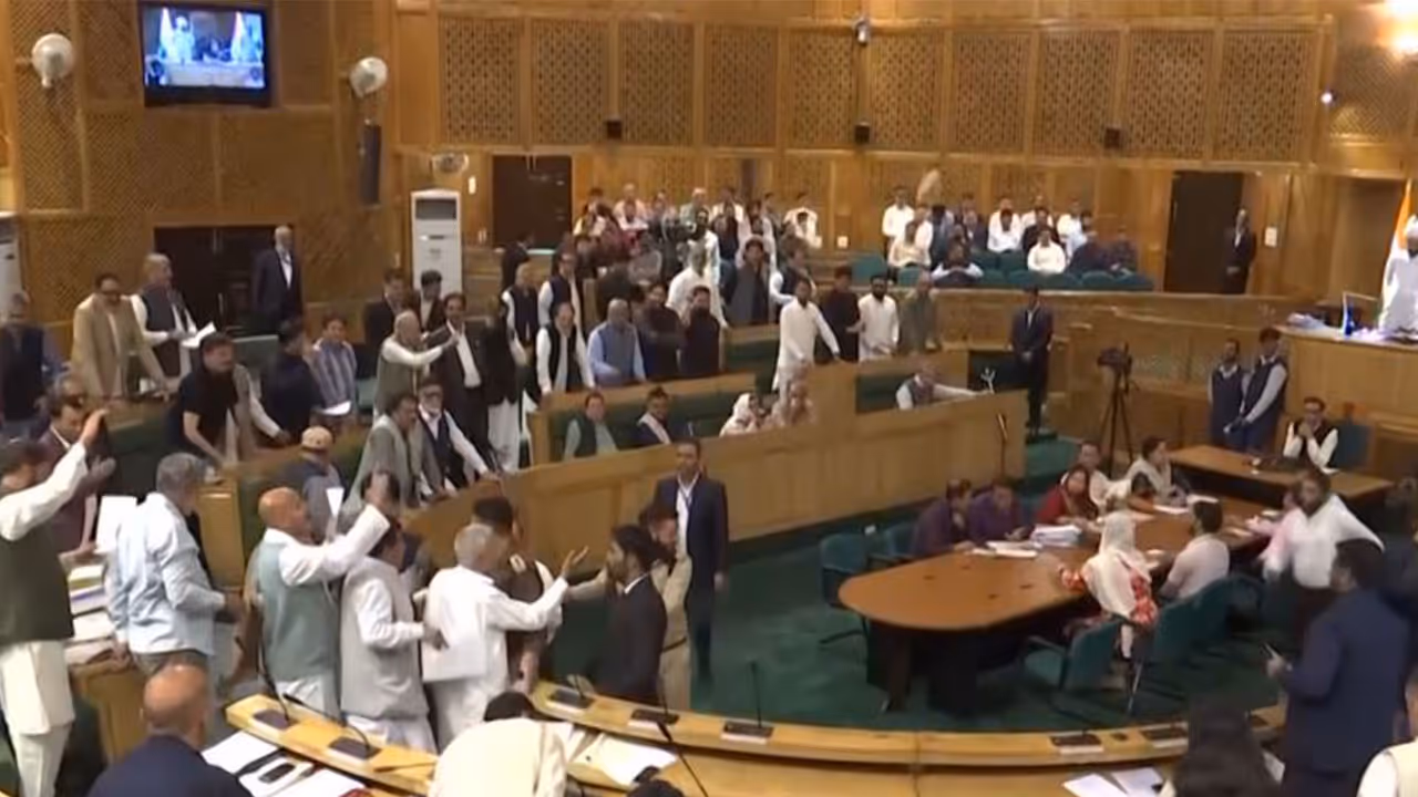 Congress MLAs protest inside the Jammu and Kashmir Legislative Assembly session (Photo/ANI) Congress MLAs protest inside the Jammu and Kashmir Legislative Assembly session (Photo/ANI)