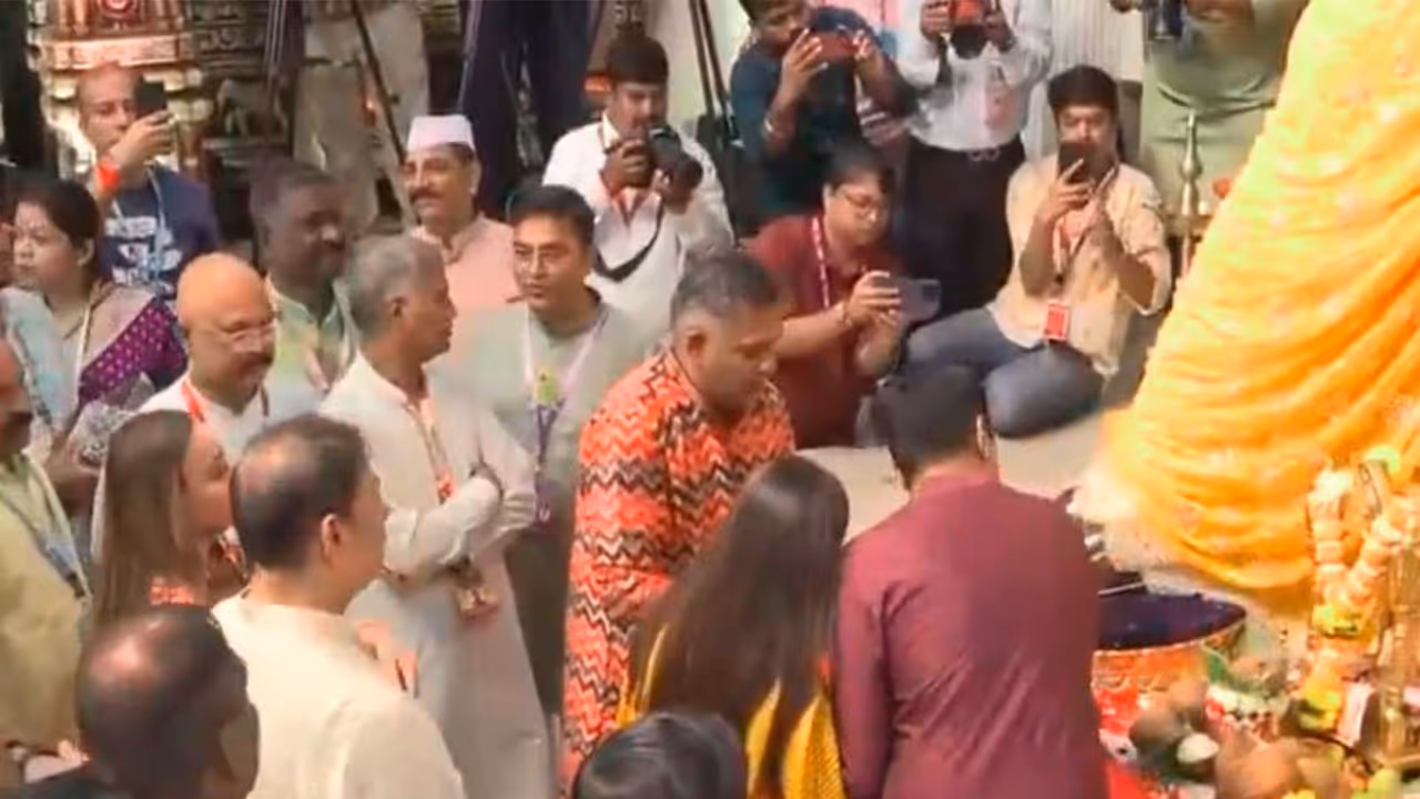 Adani family offering prayers (Photo/ANI) Adani family offering prayers (Photo/ANI)