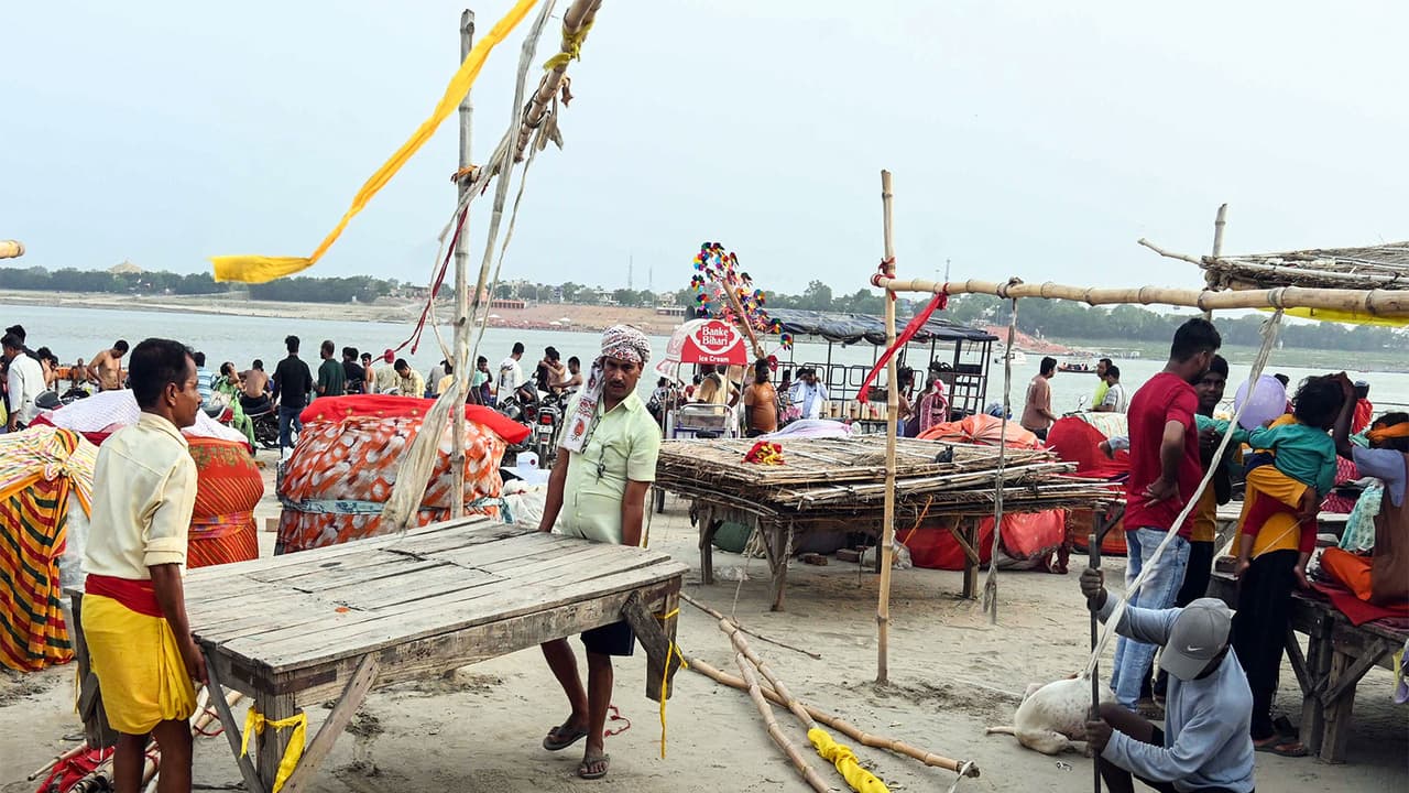 People move to safer places as monsoon rains flood Sangam area in Prayagraj (File Photo/ANI) People move to safer places as monsoon rains flood Sangam area in Prayagraj (File Photo/ANI)