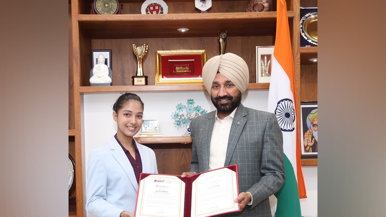 Janvi with MP Satnam Singh Sandhu. (Photo: Chandigarh University) Janvi with MP Satnam Singh Sandhu. (Photo: Chandigarh University)