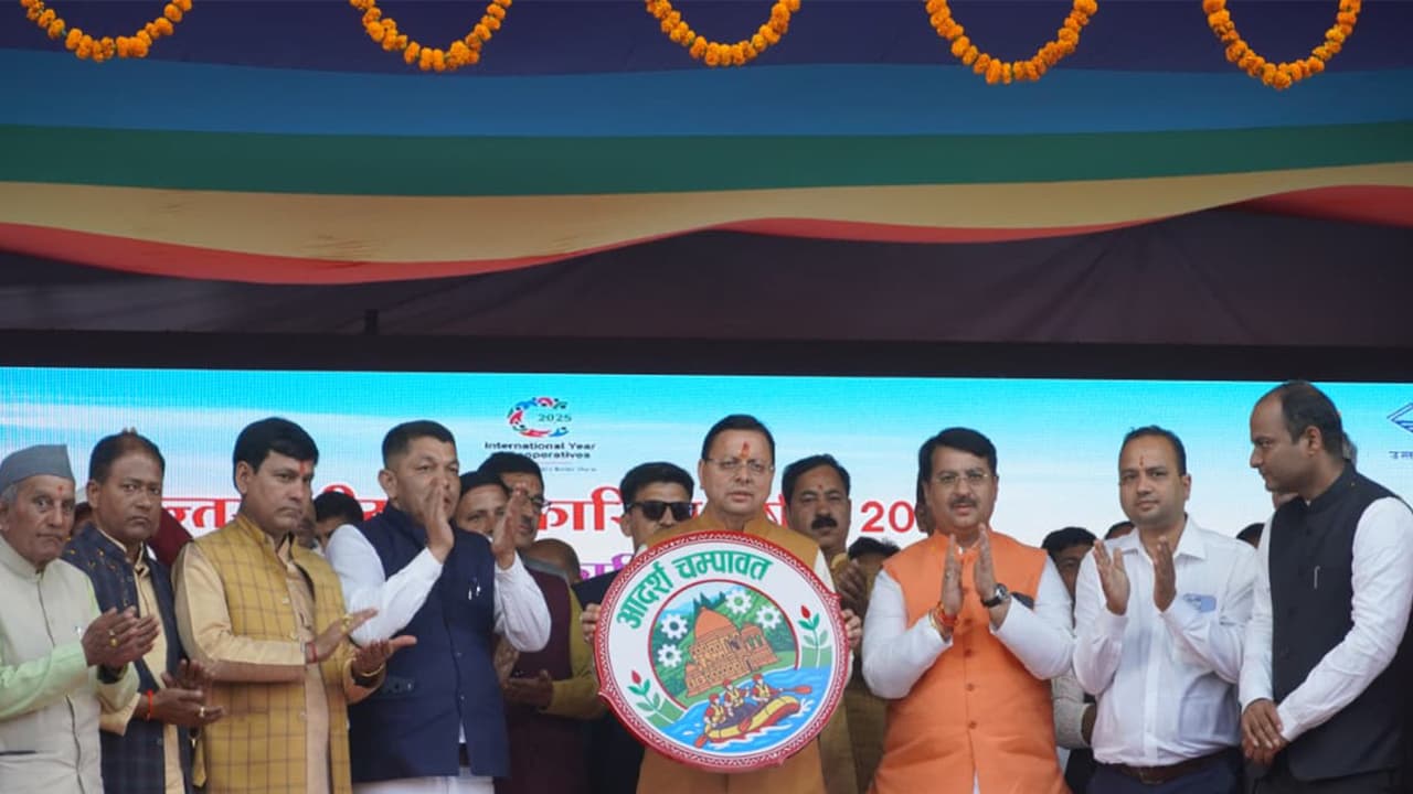CM Dhami unveils logo of ‘Adarsh Champawat’. (Photo/ANI)