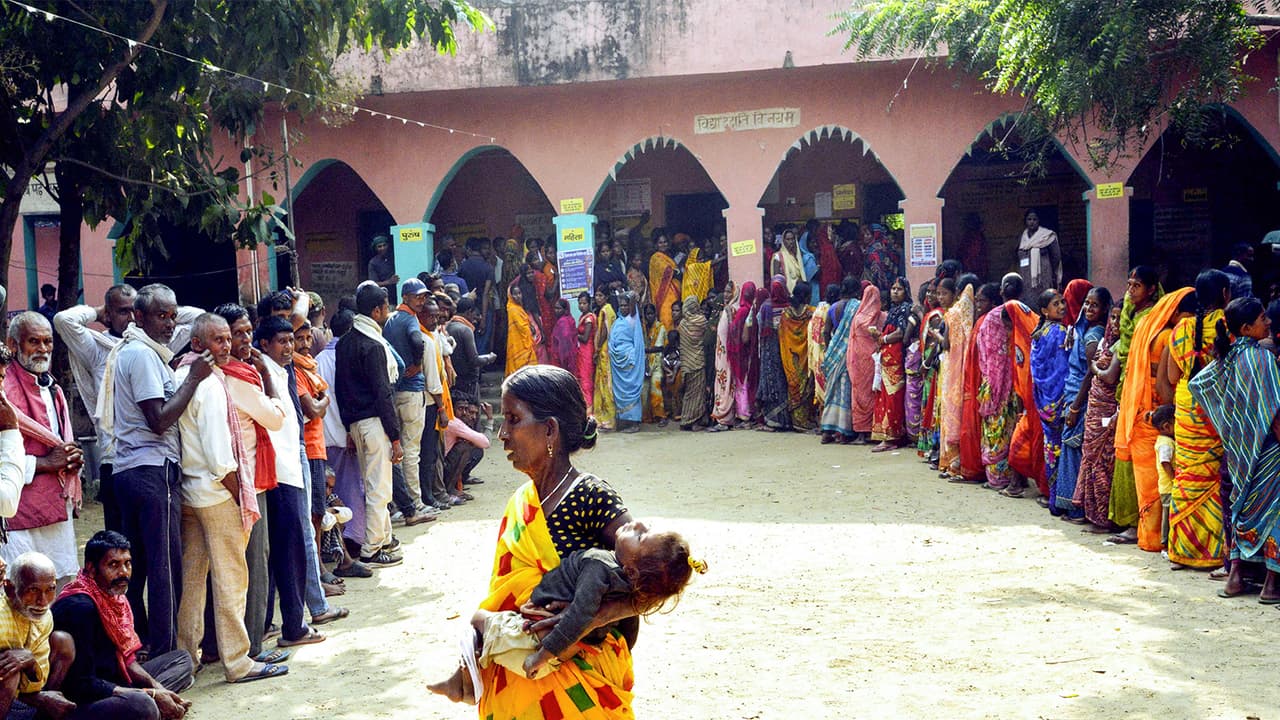 Voters wait in queues to cast their vote (Photo/ANI) Voters wait in queues to cast their vote (Photo/ANI)