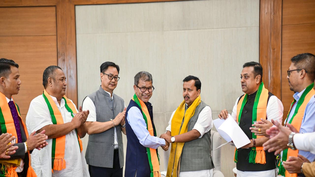 UDP MLAs join BJP in presence of National President Nitin Nabin and Union Minister Kiren Rijiju (Photo/ANI) UDP MLAs join BJP in presence of National President Nitin Nabin and Union Minister Kiren Rijiju (Photo/ANI)