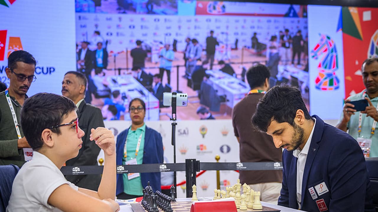 Faustino Oro and Vidit Gujrathi (Photo: Michal Walusza/FIDE)