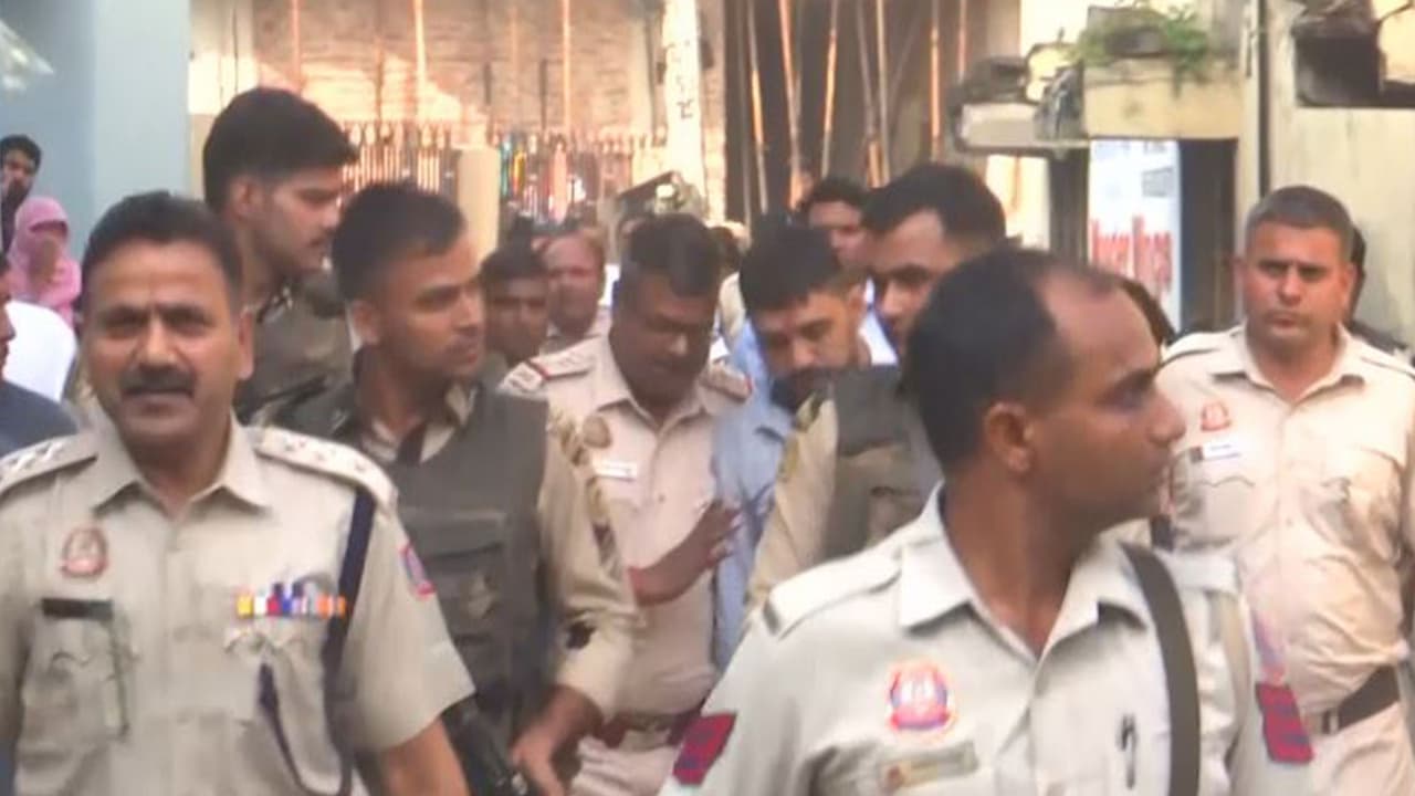 Gangster Kala Jatheri taken back to Delhi Central Jail after seven hour custody parole for twin daughters' religious ceremonies (Photo/ANI) Gangster Kala Jatheri taken back to Delhi Central Jail after seven hour custody parole for twin daughters' religious ceremonies (Photo/ANI)