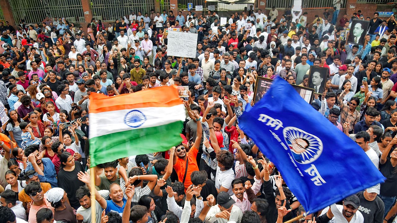 Protesters celebrate news of Dharmendra Pradhan's resignation at Jantar Mantar (Photo/ANI) Protesters celebrate news of Dharmendra Pradhan's resignation at Jantar Mantar (Photo/ANI)