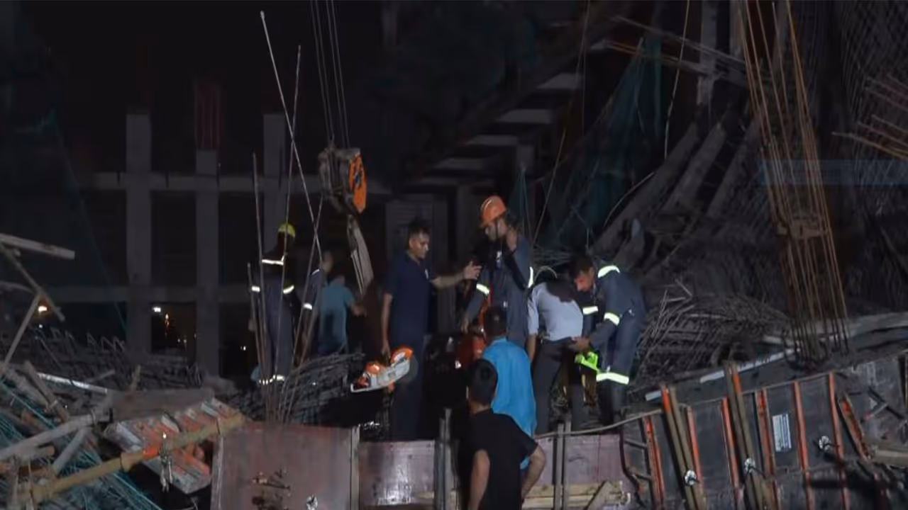Rescue operations underway after a portion of an under construction building collapsed in Gandhinagar (Photo/ANI) Rescue operations underway after a portion of an under construction building collapsed in Gandhinagar (Photo/ANI)