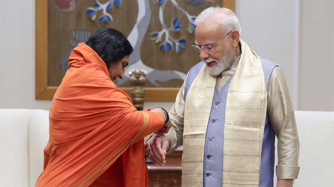 Sadhvi Ritambhara ties a Raksha Sutra to PM Modi on the occasion of Raksha Bandhan (Photo/X/@DidiRitambhara) Sadhvi Ritambhara ties a Raksha Sutra to PM Modi on the occasion of Raksha Bandhan (Photo/X/@DidiRitambhara)