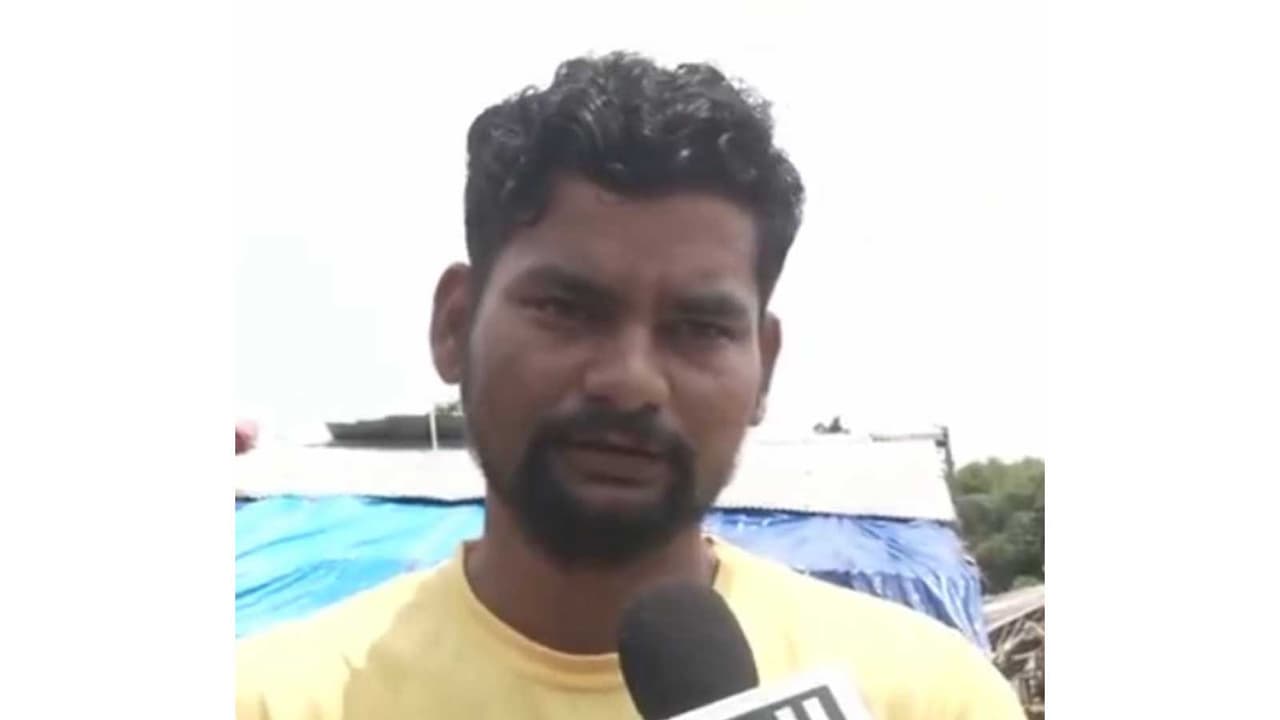 A local villager involved in rescue efforts in Sivasagar *Pho A local villager involved in rescue efforts in Sivasagar *Pho