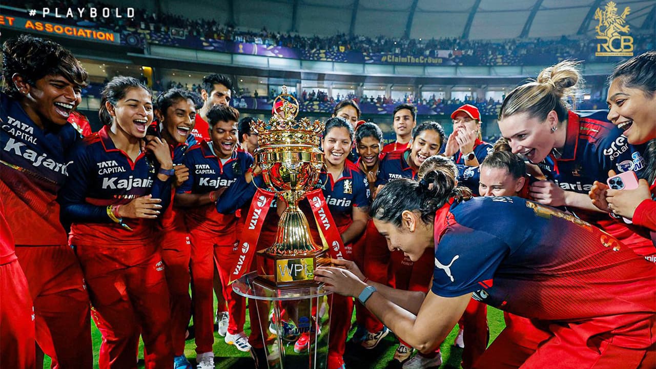 RCB team with the WPL trophy (Photo: @RCBTweets X) RCB team with the WPL trophy (Photo: @RCBTweets X)