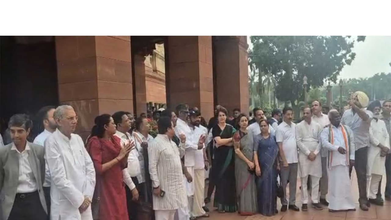 Opposition MPs staging protest in parliament (Photo/ANI) Opposition MPs staging protest in parliament (Photo/ANI)