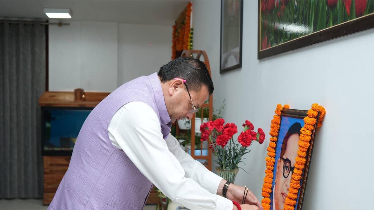 Uttarakhand CM Dhami pays tribute to B.R. Ambedkar (Photo/ANI) Uttarakhand CM Dhami pays tribute to B.R. Ambedkar (Photo/ANI)