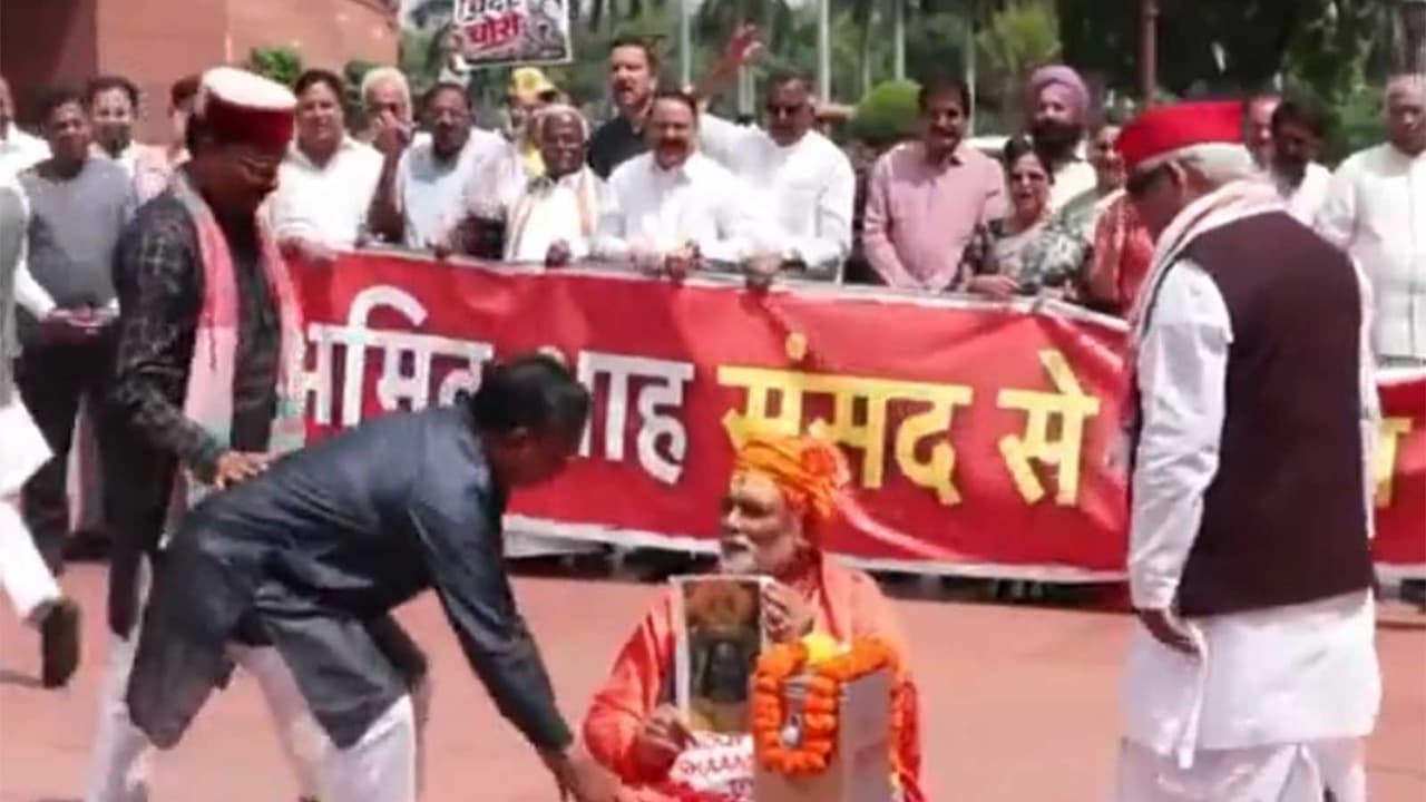 Opposition protests over Ram Mandir donation embezzlement (Photo/ANI) Opposition protests over Ram Mandir donation embezzlement (Photo/ANI)