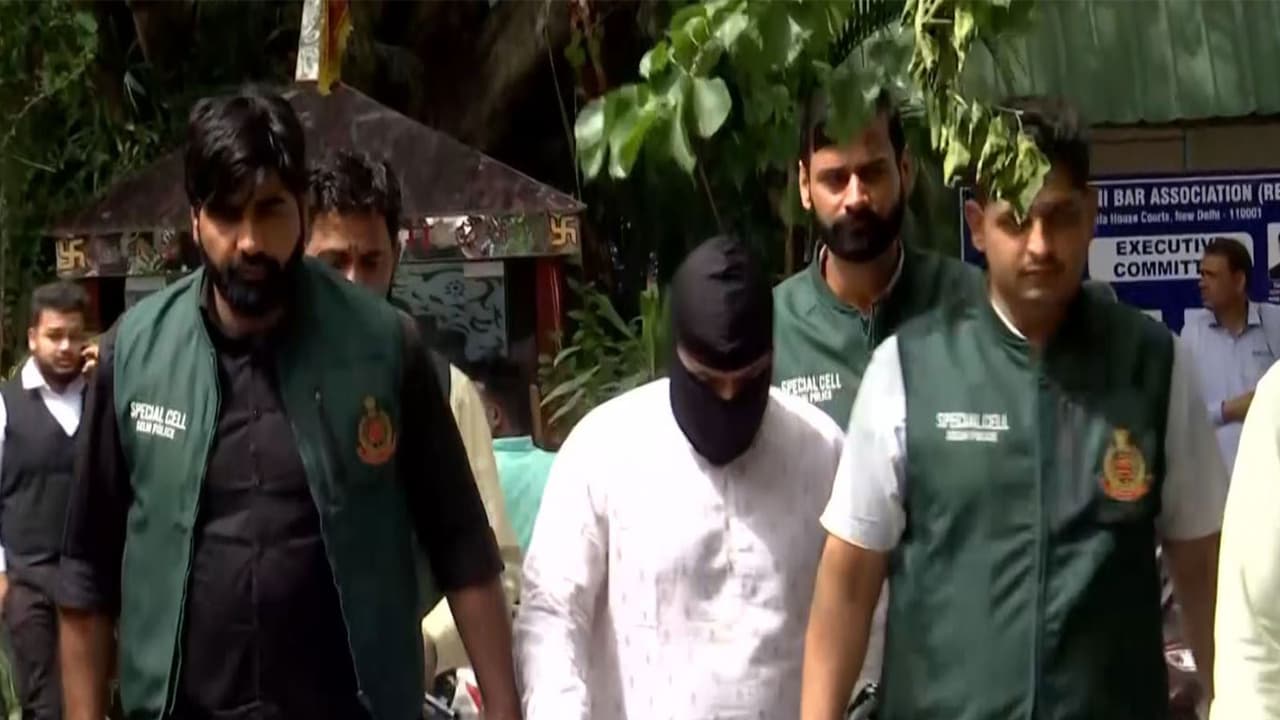 Shabbir Ahmed Lone in Police Custody (Photo/ANI) Shabbir Ahmed Lone in Police Custody (Photo/ANI)