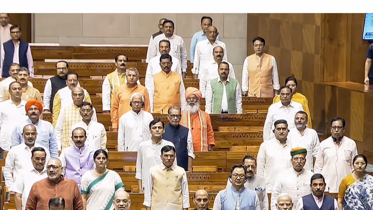 Prime Minister Narendra Modi stands for 'Vande Mataram' in Lok Sabha during the Monsoon Session in New Delhi on Thursday. Union Ministers Amit Shah, Rajnath Singh and others are also present (Photo: Sansad TV) Prime Minister Narendra Modi stands for 'Vande Mataram' in Lok Sabha during the Monsoon Session in New Delhi on Thursday. Union Ministers Amit Shah, Rajnath Singh and others are also present (Photo: Sansad TV)