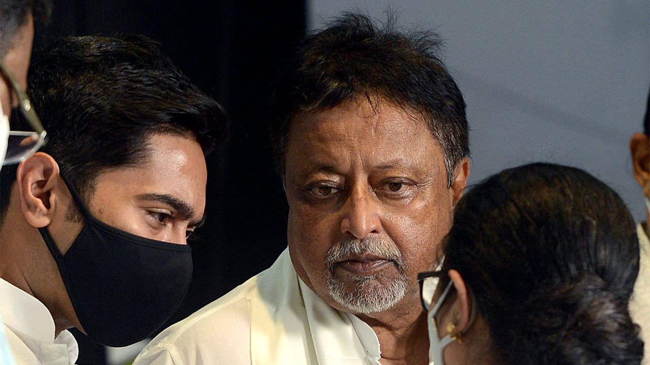 West Bengal CM Mamata Banerjee with Mukul Roy (File Photo/ANI) West Bengal CM Mamata Banerjee with Mukul Roy (File Photo/ANI)