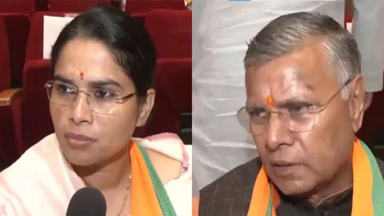 BJP leaders Pooja Pal (L) and Dharmveer Prajapati (R) (Photo/ANI) BJP leaders Pooja Pal (L) and Dharmveer Prajapati (R) (Photo/ANI)