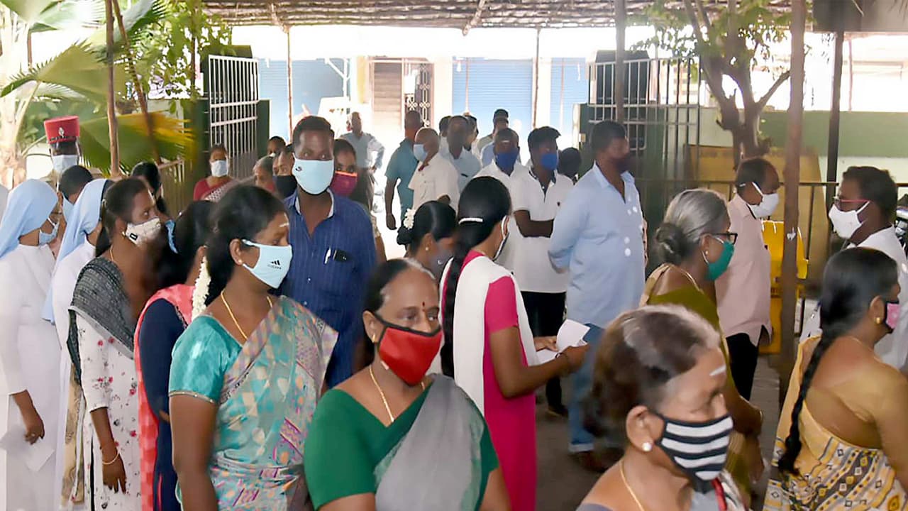 Voters standing in queue to cast their votes at a polling booth. (Photo/ANI) Voters standing in queue to cast their votes at a polling booth. (Photo/ANI)