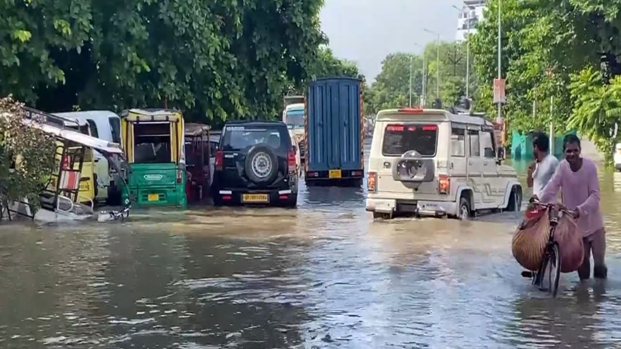 Waterlogging in Prayagraj following heavy rain (Photo/ANI) Waterlogging in Prayagraj following heavy rain (Photo/ANI)