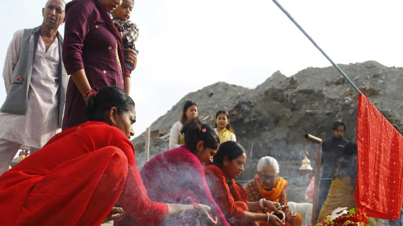 Devotees perform rituals and offer prayers using holy stones ("Shila") at the site of destroyed shrines in Devighat, Nuwakot district, following the August 26 flash flood (Photo/ANI) Devotees perform rituals and offer prayers using holy stones ("Shila") at the site of destroyed shrines in Devighat, Nuwakot district, following the August 26 flash flood (Photo/ANI)