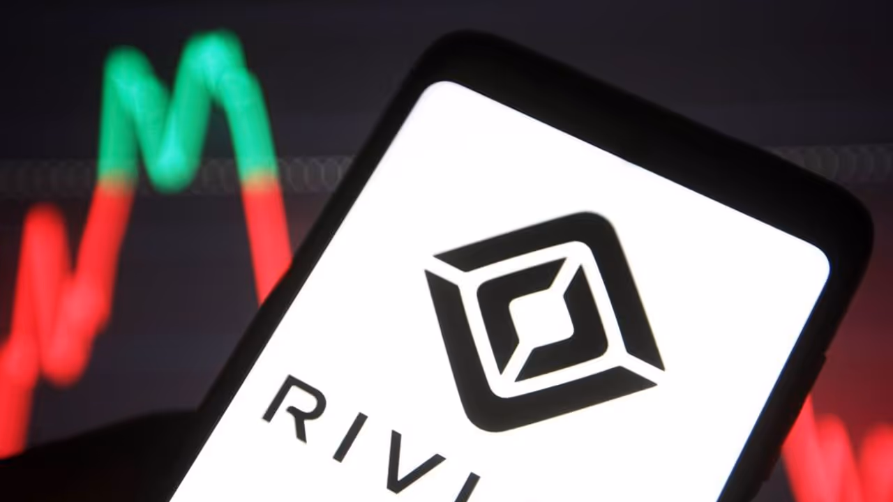 https://stocktwits.com/news articles/markets/equity/rivian stock slides after guggenheim downgrade/ch89RIKR5VC