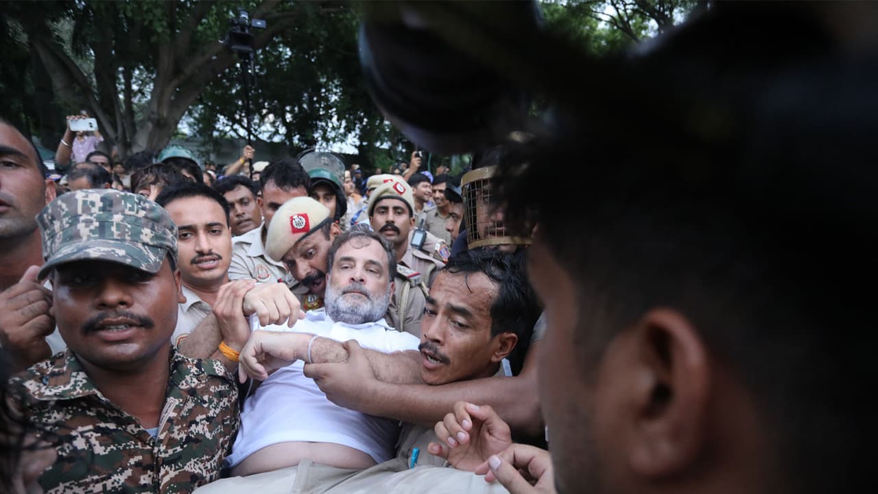 Rahul Gandhi being detained by Delhi Police (Photo/X/@INCIndia) Rahul Gandhi being detained by Delhi Police (Photo/X/@INCIndia)