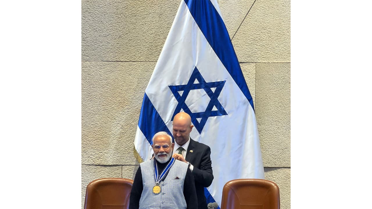 Prime Minister Narendra Modi being conferred 'Speaker of the Knesset Medal' (Photo/ANI) Prime Minister Narendra Modi being conferred 'Speaker of the Knesset Medal' (Photo/ANI)