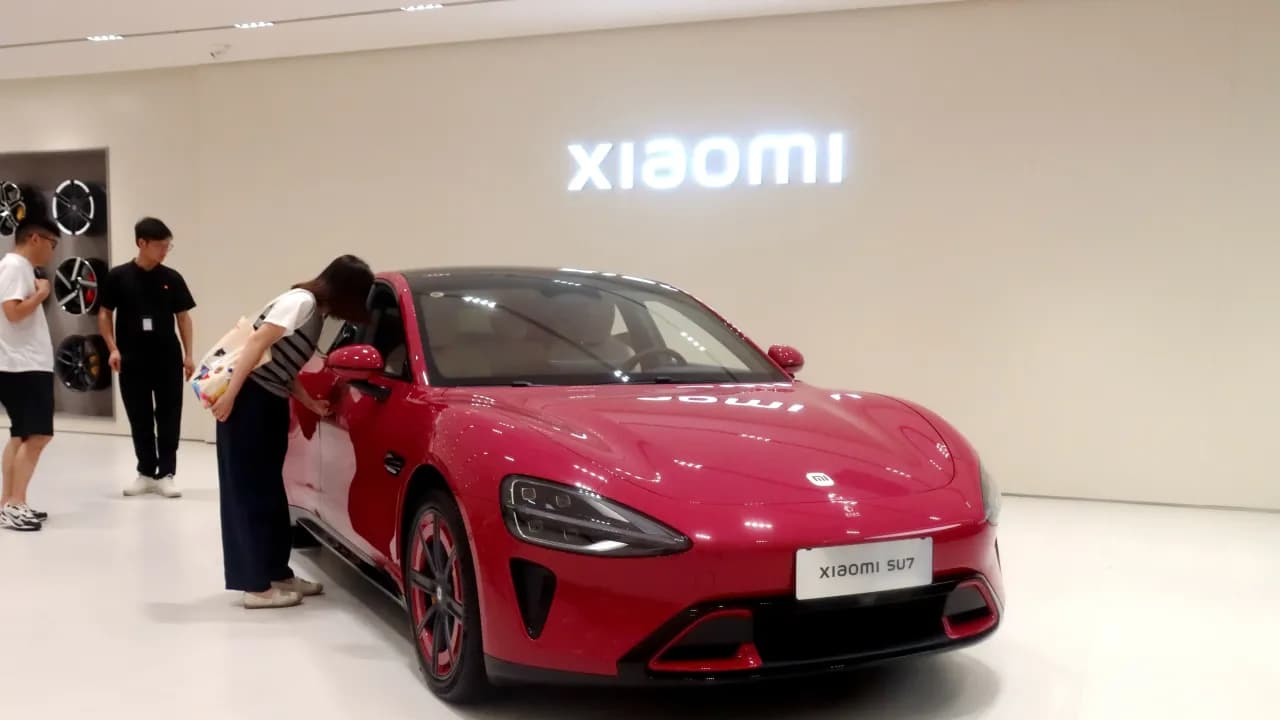 https://stocktwits.com/news articles/markets/equity/xiaomi stock snaps 3 day losing streak as ev unit turns first profit and nears full year delivery target in 18 months/cLP8uTAREJB