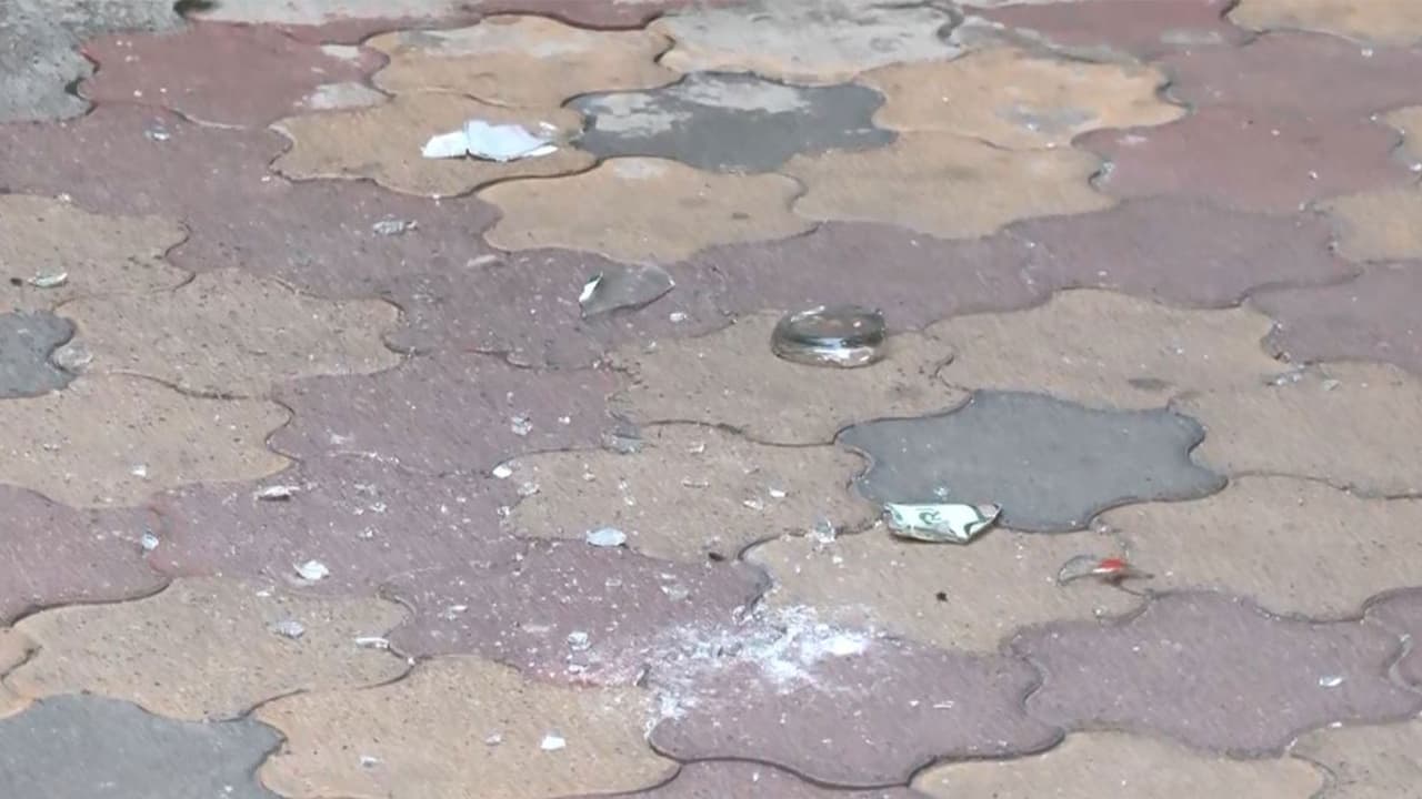 Pieces of bottles found inside the RSS office premises (Photo/ANI) Pieces of bottles found inside the RSS office premises (Photo/ANI)