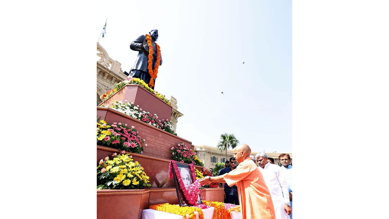 Uttar Pradesh CM Yogi Adityanath paying floral tribute to Chaudhary Charan Singh (Photo/X/ @myogiadityanath) Uttar Pradesh CM Yogi Adityanath paying floral tribute to Chaudhary Charan Singh (Photo/X/ @myogiadityanath)