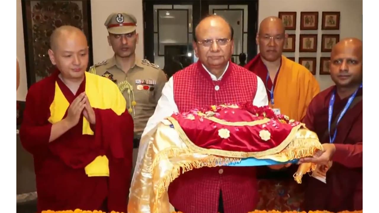 Lieutenant Governor of Ladakh Vinai Kumar Saxena carrying the holy relics (Photo/ANI) Lieutenant Governor of Ladakh Vinai Kumar Saxena carrying the holy relics (Photo/ANI)