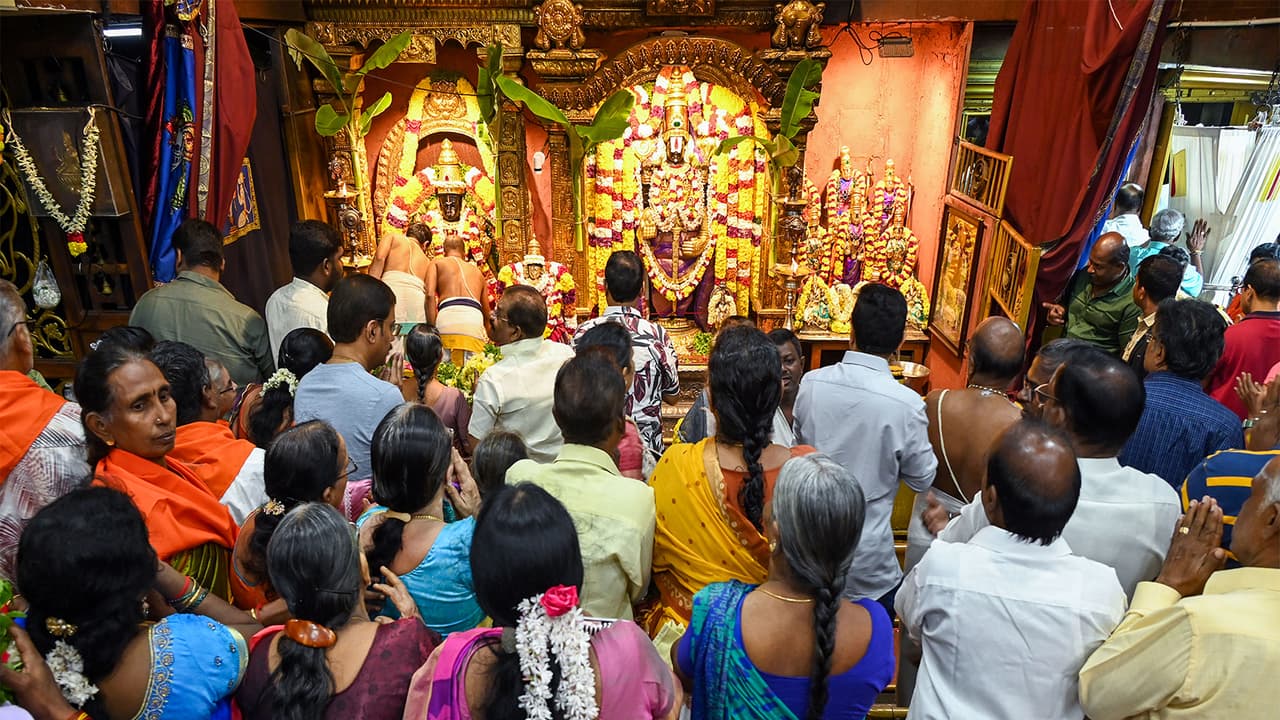 Devotees offer prayers at the Tirumala Tirupati Devasthanams Temple (File Photo/ANI)