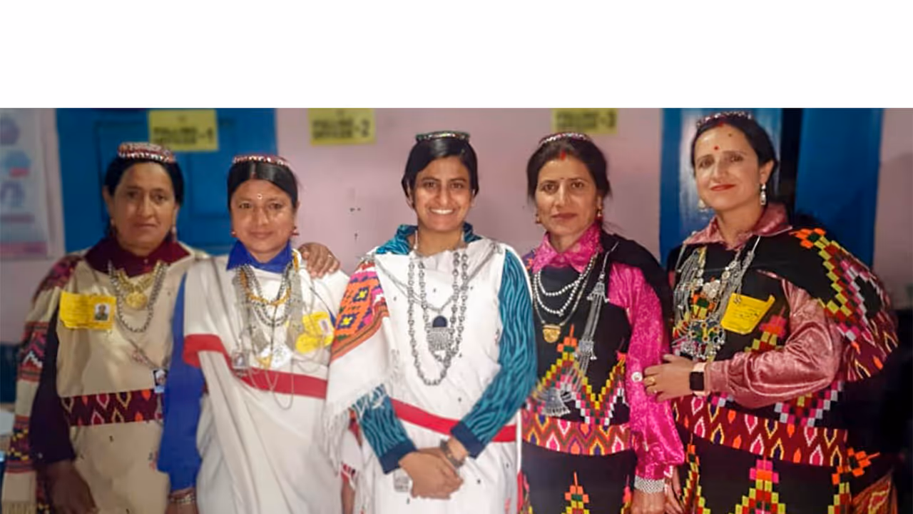 Polling officials dressed in traditional attire pose for a photo for Lok Sabha elections 2024. (Image: ANI) Polling officials dressed in traditional attire pose for a photo for Lok Sabha elections 2024. (Image: ANI)