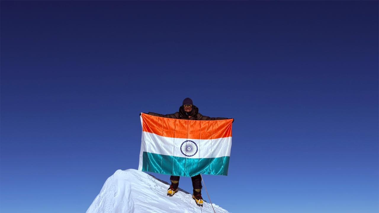 Indian mountaineer Kavita Chand poses with the national tricolour after successfully summiting Mount Vinson, the highest peak in Antarctica, marking a key milestone in her Seven Summits quest (Photo/ANI)