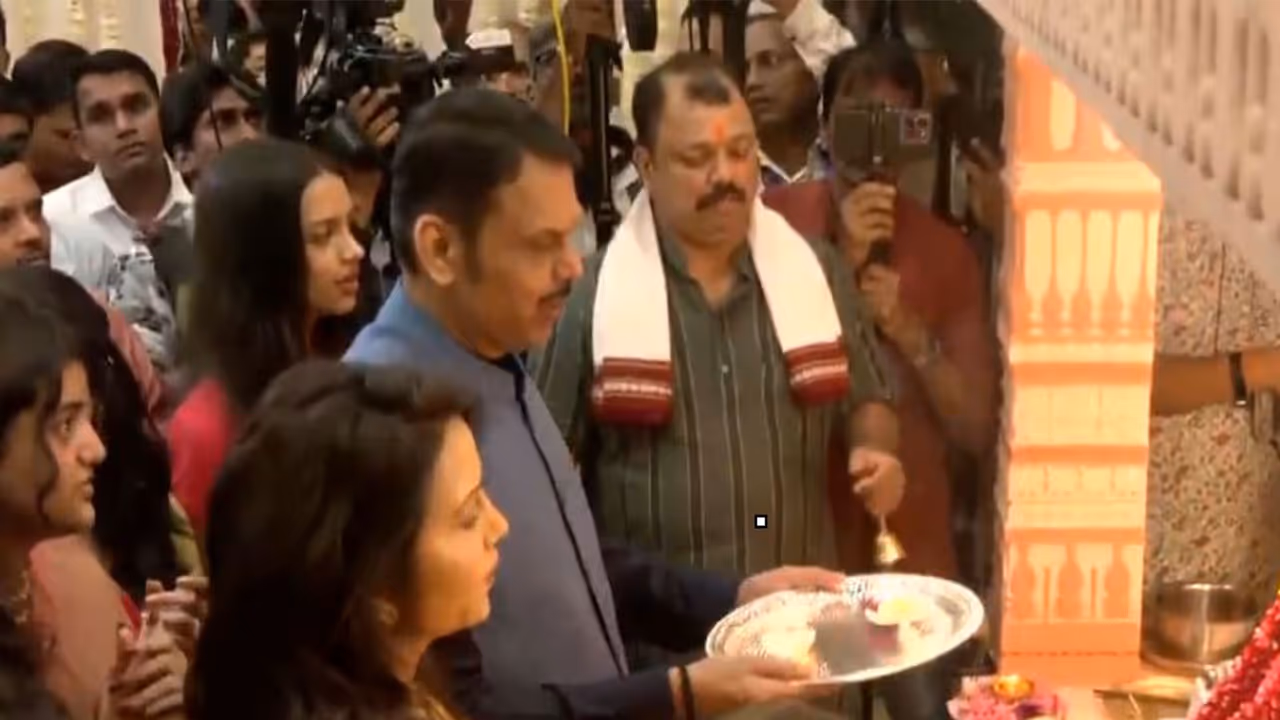 Maharashtra CM Devendra Fadnavis, along with his wife Amruta Fadnavis, performs aarti on Ganesh Chaturthi (Photo/ANI) Maharashtra CM Devendra Fadnavis, along with his wife Amruta Fadnavis, performs aarti on Ganesh Chaturthi (Photo/ANI)