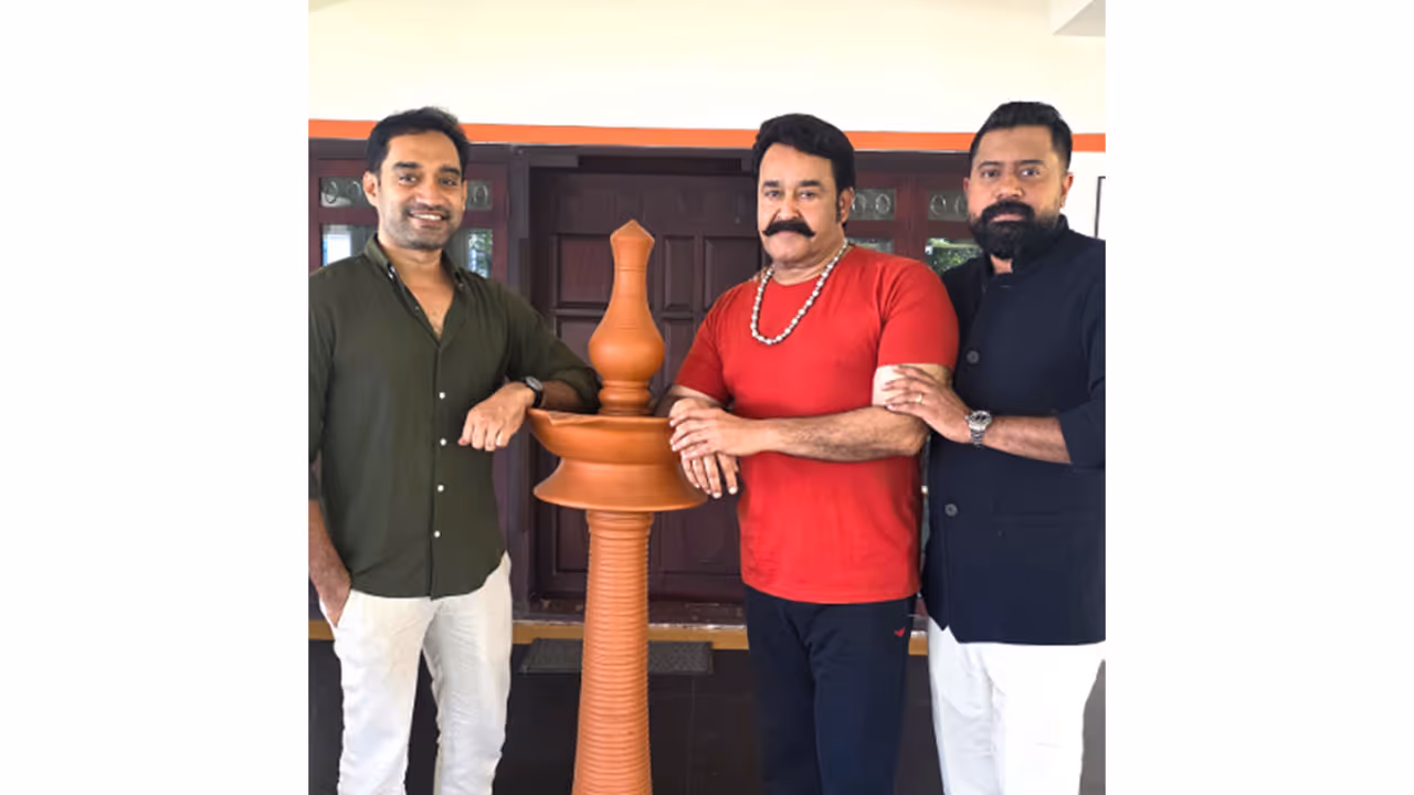 L R Director Anoop Sathyan, Mohanlal and producer Binu George Alexander (Photo/X@Mohanlal) L R Director Anoop Sathyan, Mohanlal and producer Binu George Alexander (Photo/X@Mohanlal)