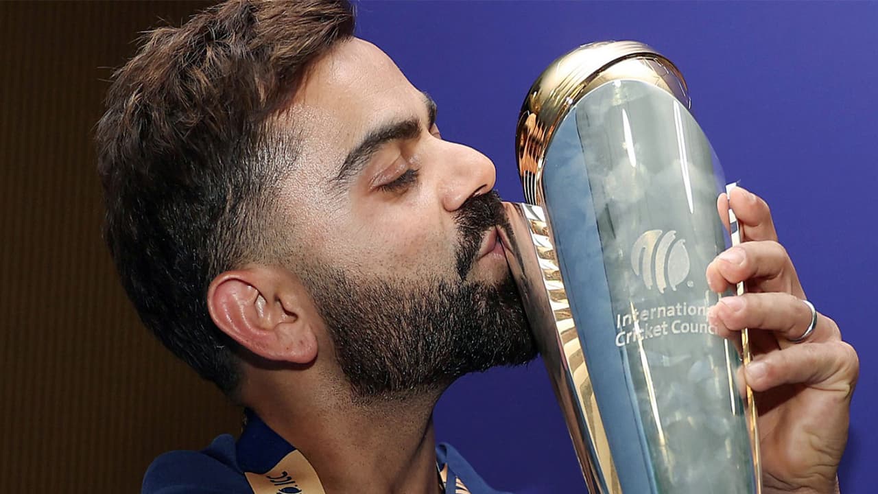 Virat Kohli with the ICC Men's Champions Trophy (Photo/ANI)