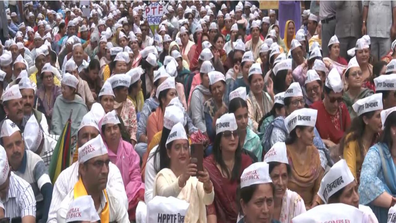 Teachers protesting against school complex system policy of the Himachal government. (Photo/ANI) Teachers protesting against school complex system policy of the Himachal government. (Photo/ANI)